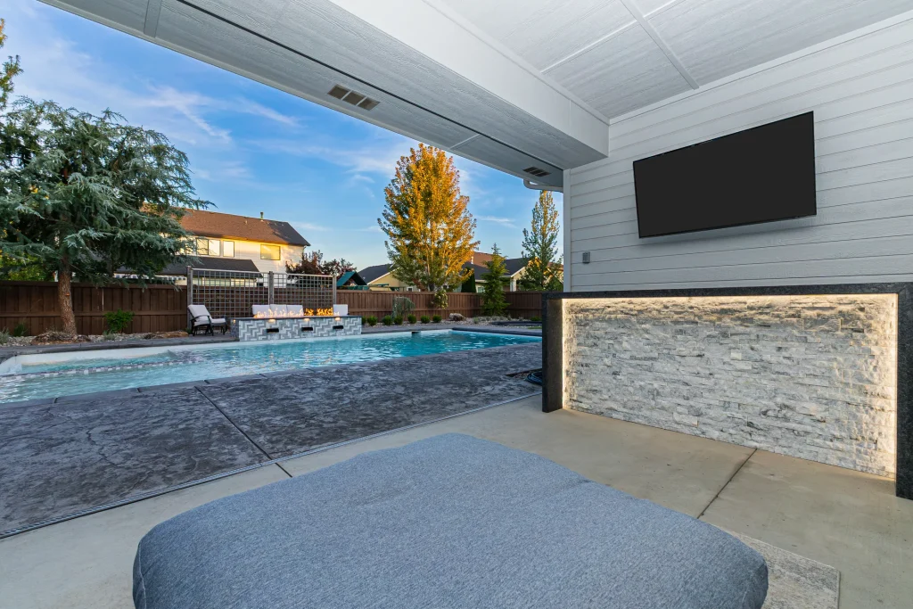 Backyard pool with spa and stamped concrete deck