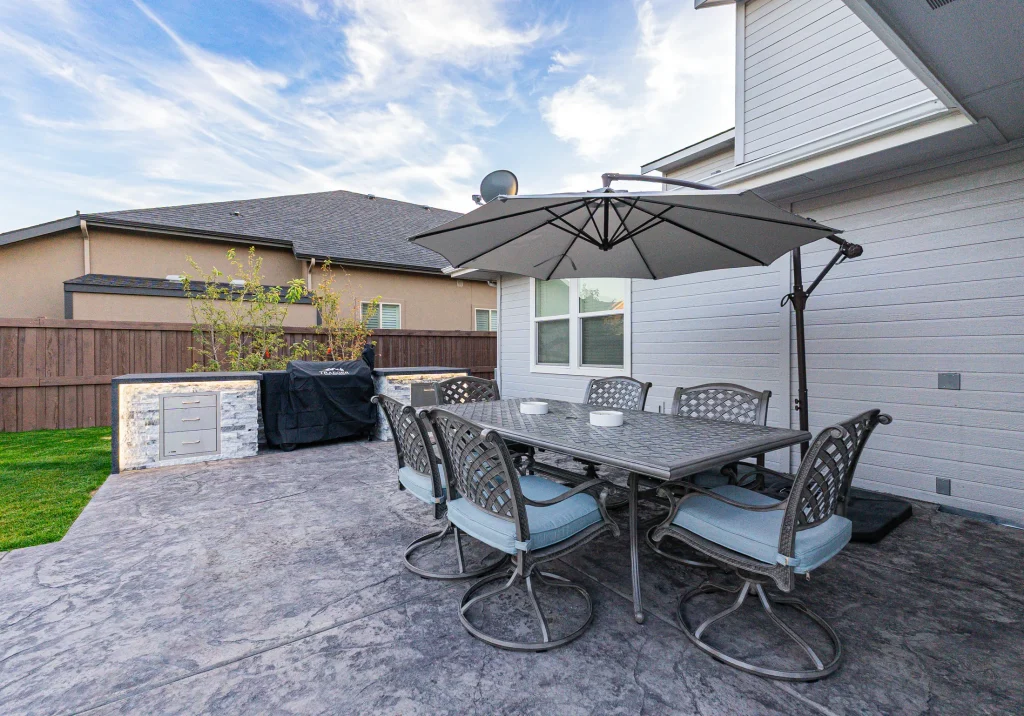 Covered outdoor dining and kitchen area