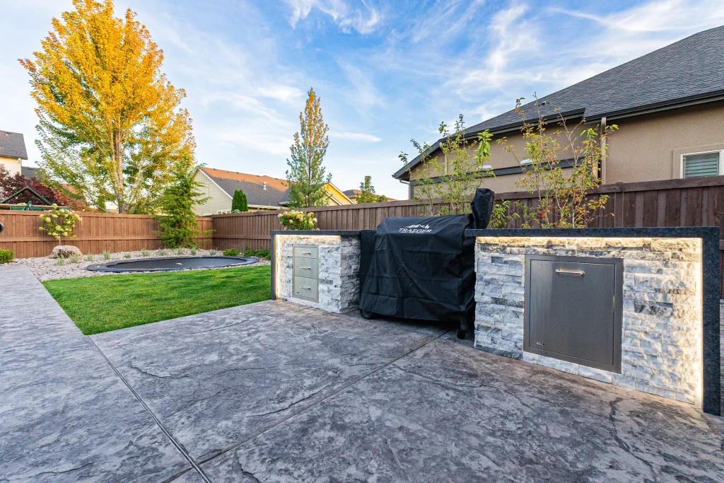 Covered outdoor dining and kitchen area