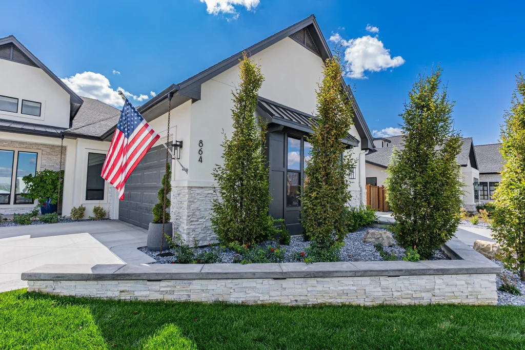 Front of the residence with landscaping