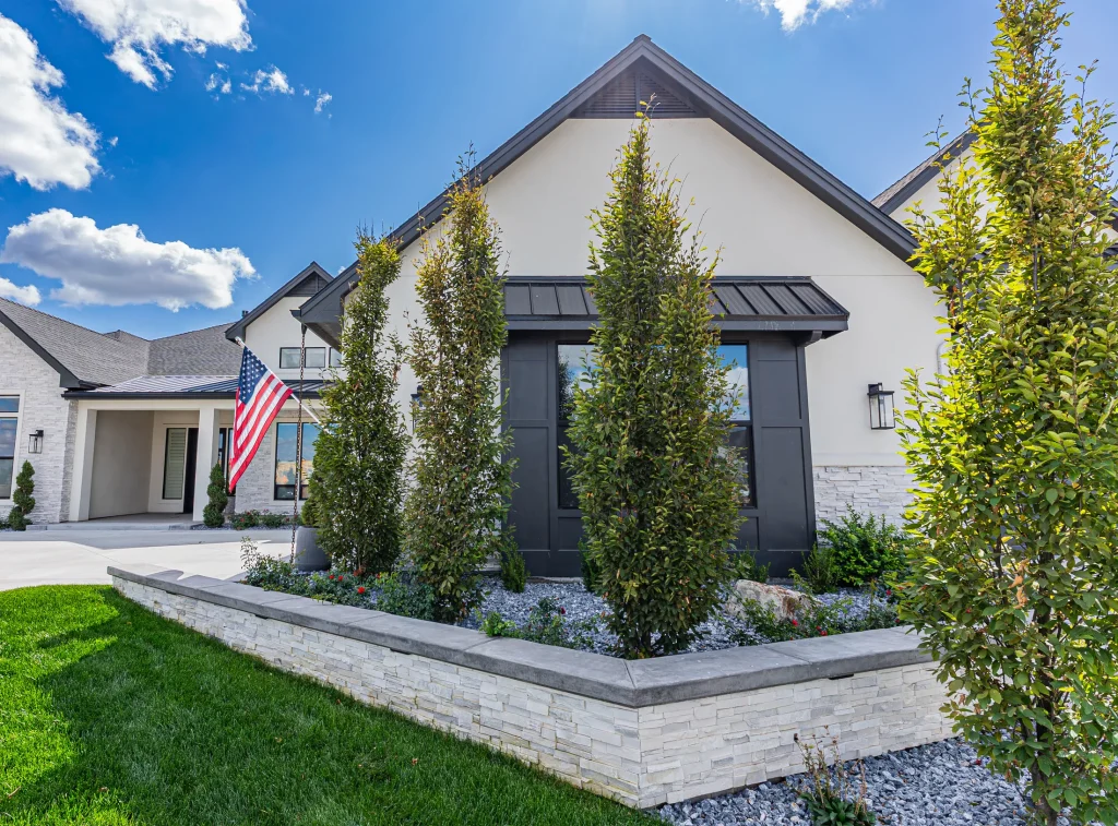 Front of the residence with landscaping